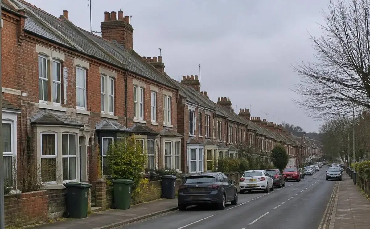 Red-brick Victorian terraced houses on a leafy St Albans street